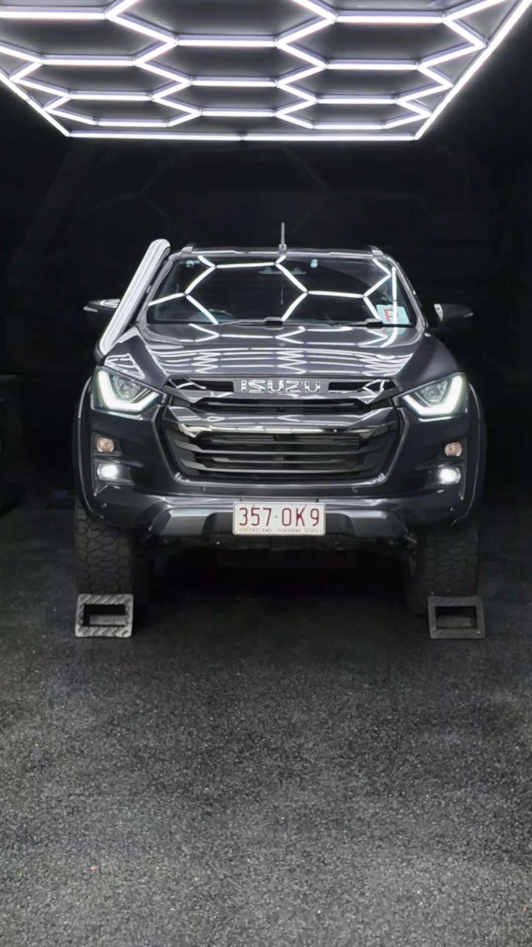 Isuzu D-Max under hexagon lights